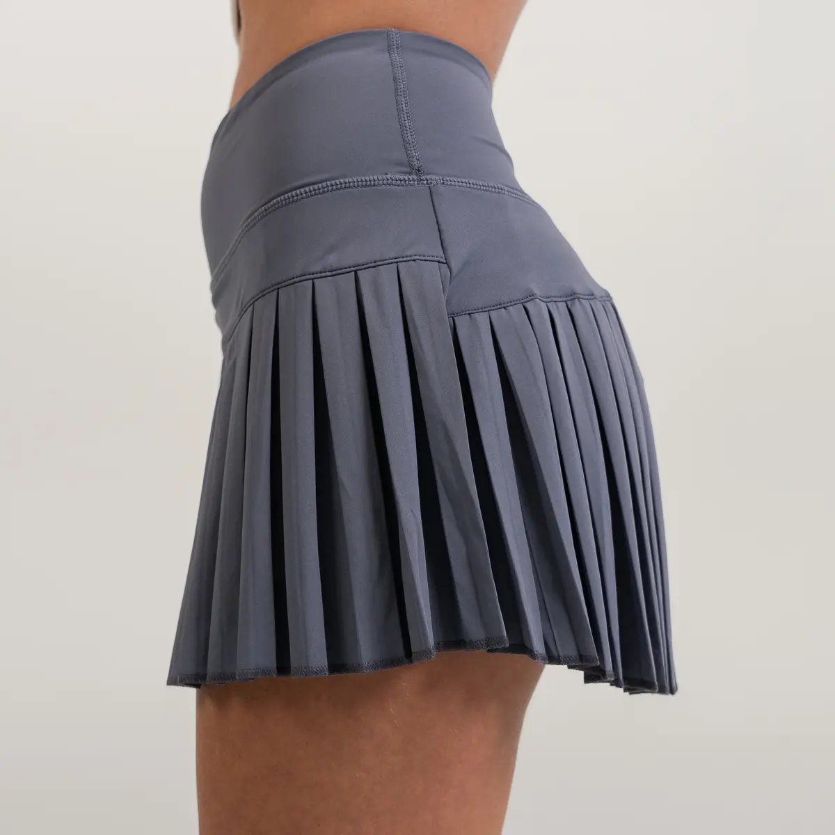 Image of Babe Pleated Skirt – Flattering & Sporty Athleisure - Color - Blue - Blue Logo - 4 / 6