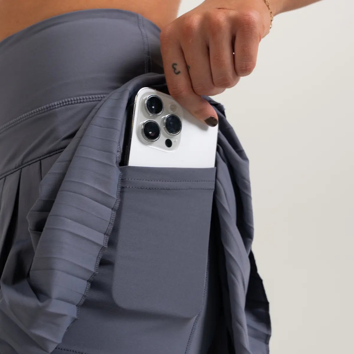 Image of Babe Pleated Skirt – Flattering & Sporty Athleisure - Color - Blue - Blue Logo - 6 / 6