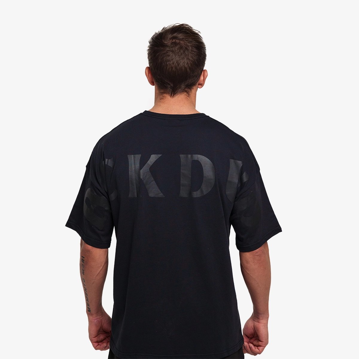 Image of BCKD Drop Shoulder Oversized T-Shirt - Color - Black - Black Logo
