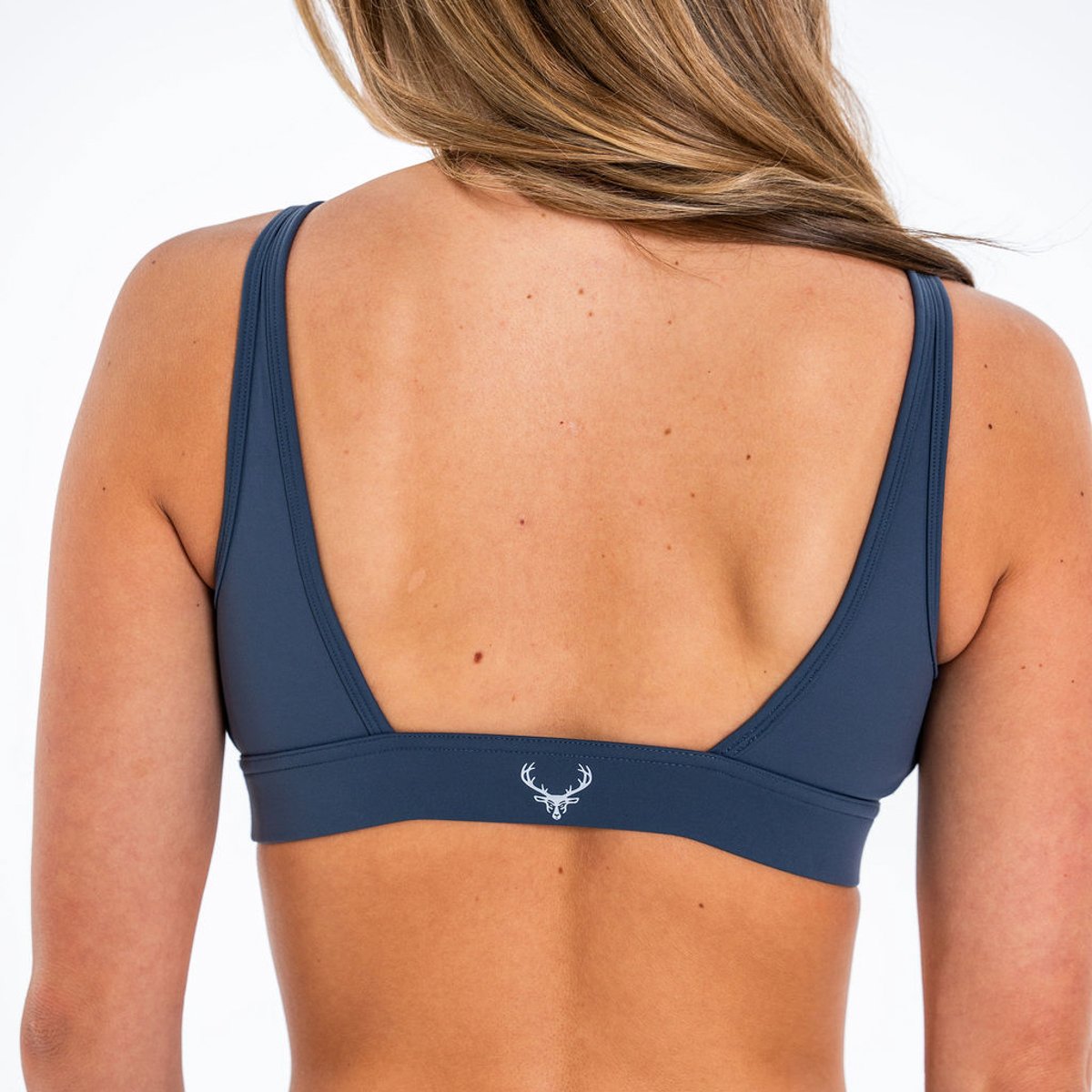 Image of Sculpt Plunge Sports Bra - Color - Steel Blue - Silver Logo