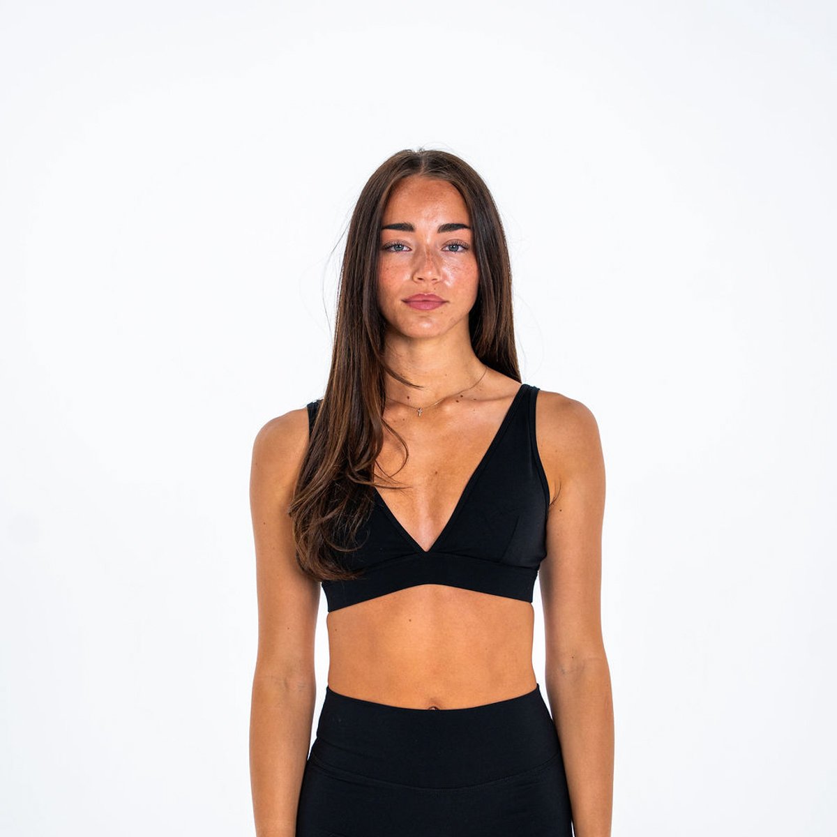 Image of Sculpt Plunge Sports Bra - Color - Black - Silver Logo