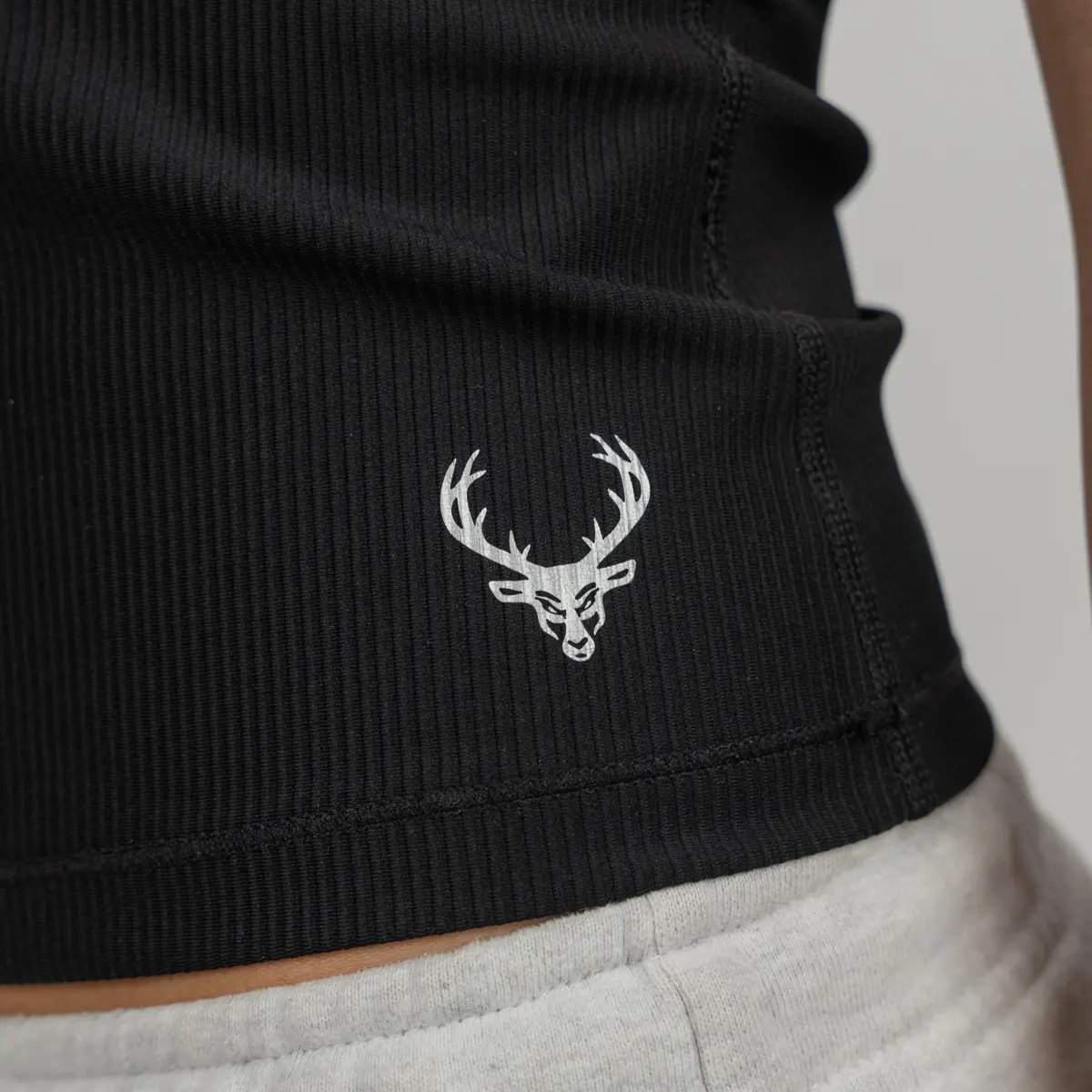 Image of Ribbed Racerback Tank - Color - Black / Silver Logo