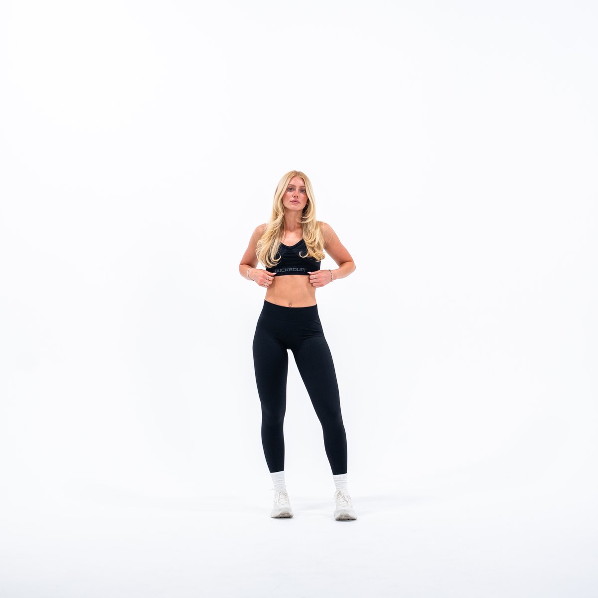 Image of In Motion Seamless Sports Bra - Color - Black / Gray Logo - 4 / 5