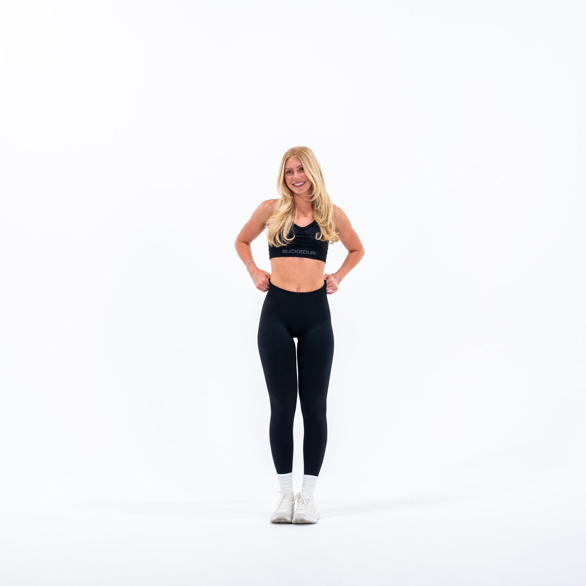 Image of In Motion Seamless Sports Bra - Color - Black / Gray Logo - 2 / 5