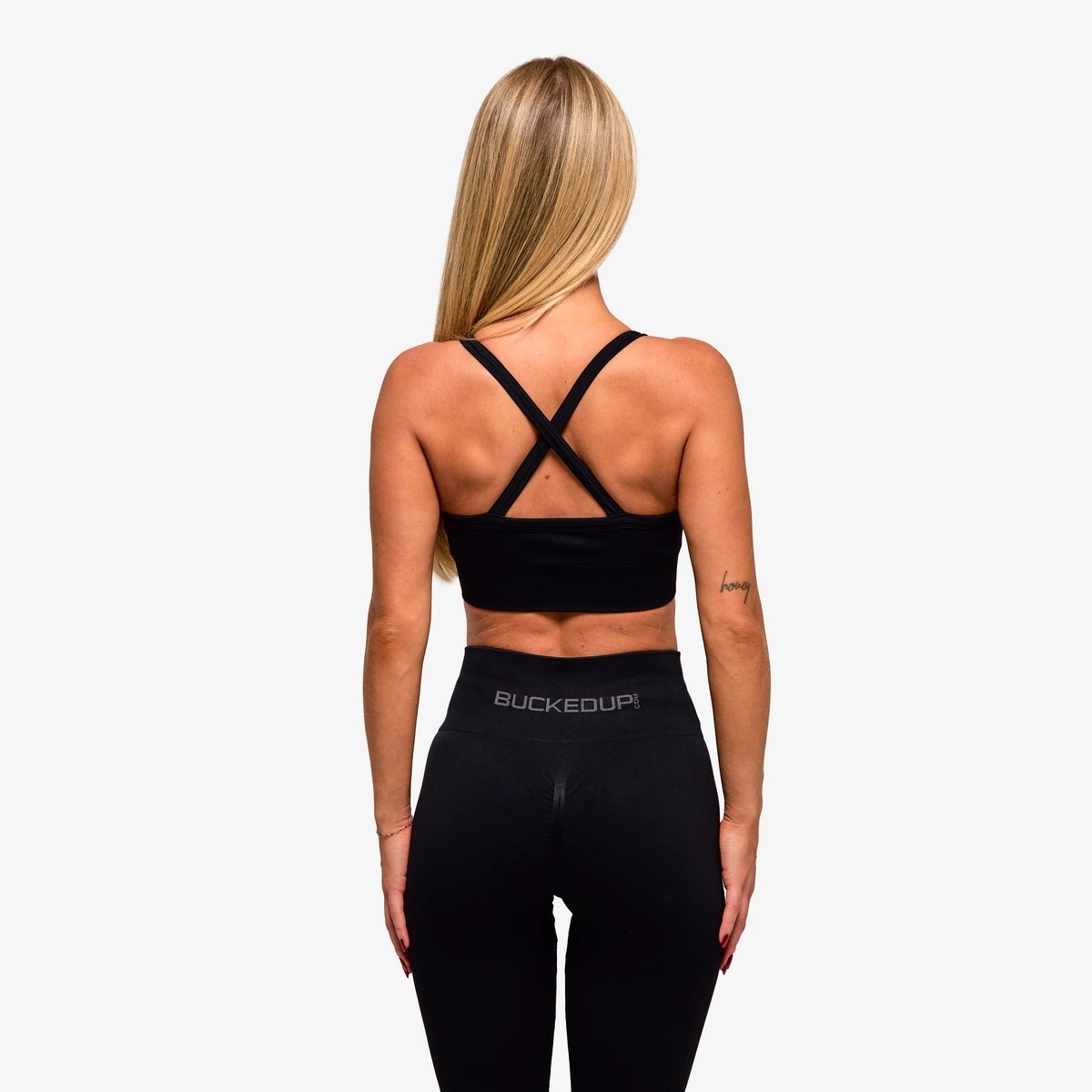 Image of In Motion Seamless Sports Bra - Color - Black / Gray Logo