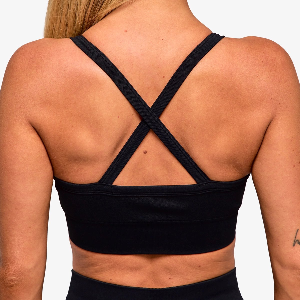 Image of In Motion Seamless Sports Bra - Color - Black / Gray Logo