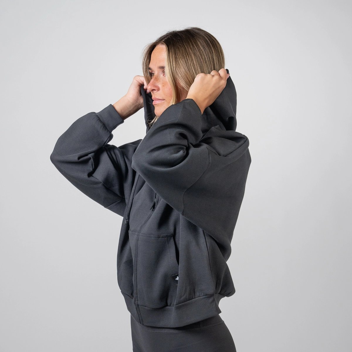 Image of Women's Zip Hoodie - Color - Black - White Logo